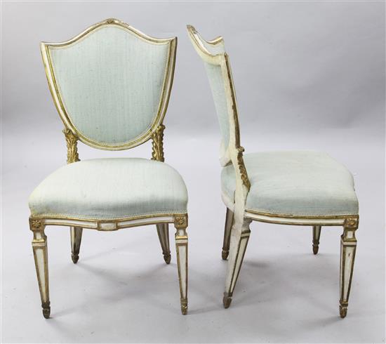 A pair of late 18th century Italian single shield back salon chairs,